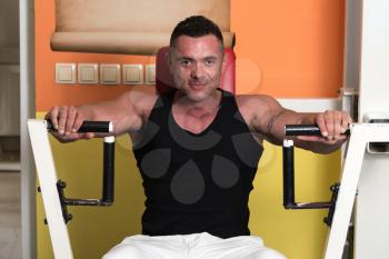 Weightlifter on Exercise Machine