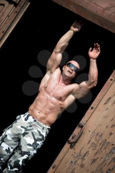 Muscular Man Catching A Train