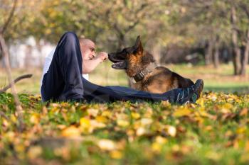 Man With Dog German Shepherd