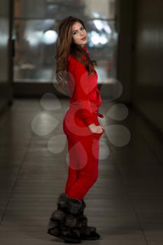 Beautiful Woman Wearing Fashion Track Suit In Red