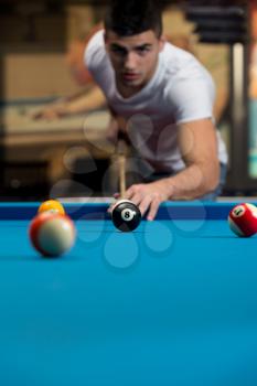 Man Playing Pool