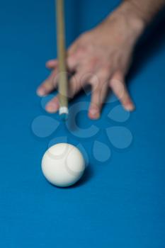 Close-Up Of A White Ball Waiting To Shoot