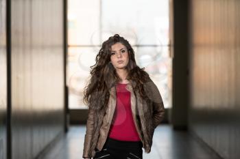 Glamour Fashion Model Wearing Brown Winter Jacket