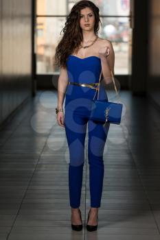 Model Showing Fancy Blue Bag