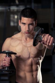 Young Athlete Exercise Power Boxing With Dumbbells