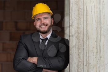 Portrait Of Young Construction Manager With Arms Crossed