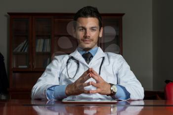 Portrait Of Smiling Young Male Doctor