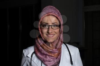 Portrait Of Smiling Muslim Female Doctor