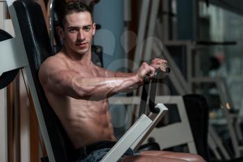 Young Bodybuilder Doing Heavy Weight Exercise For Chest