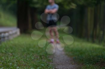 Portrait Of Young Man Doing Outdoor Activity Running - Motion Blurred Image