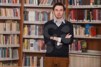 Portrait Of Clever Student In College Library - Shallow Depth Of Field
