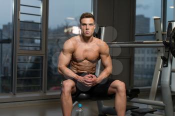 Good Looking And Attractive Young Man With Muscular Body Relaxing In Gym