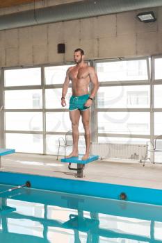 Portrait Of A Very Muscular Sexy Man In Underwear At Swimming Pool