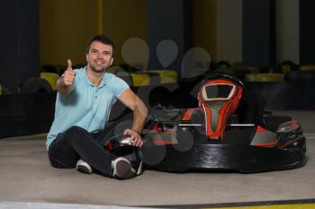 Young Man Showing Thumbs Up For Karting Race