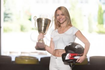 Young Woman Is Holding Cup Speed Karting Race