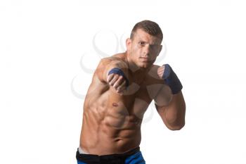 Muscular Boxer MMA Fighter Practice His Skills - Isolated On White Background