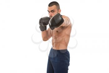 Young Muscular Sports Guy In Gloves With A Naked Torso Boxing - Isolated On White Background