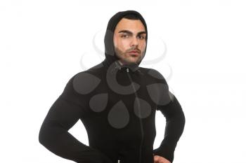 Young Muscular Man In Black Hooded Sweatshirt Showing Muscles - Isolated On White Background