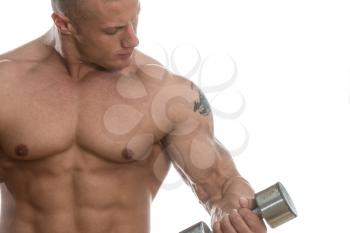 Young Muscular Bodybuilder Guy Doing Exercises With Dumbbells Over White Background
