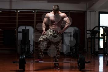 Strong Muscular Man Prepare Himself Mentally Before Lifting Deadlift