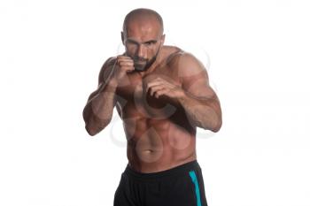 Young Muscular Sports Guy Boxing Workout Over White Background Isolated