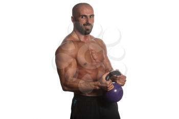 Athletic Man Workout With Kettle Bell Over White Background