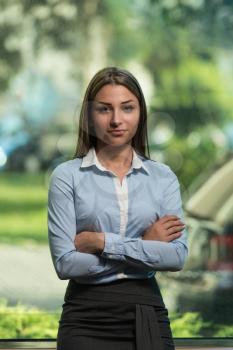 Portrait Of Handsome Beautiful Young Businesswoman Standing Arms Crossed - Successful Business Woman At Work