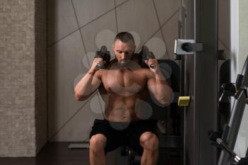 Big Man Using A Press Machine In A Fitness Club - Dont Skip Leg Day
