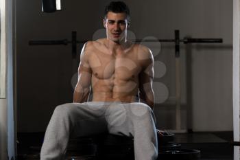 Muscular Man Resting After Exercises - Portrait Of A Physically Fit Young Man Without A Shirt