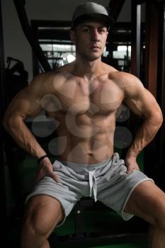 Muscular Man Resting After Exercises - Portrait Of A Physically Fit Young Man In Gym