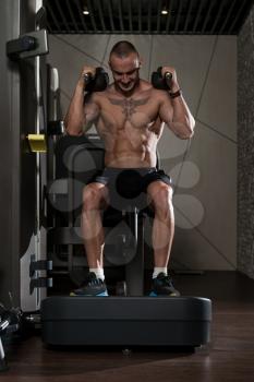 Man Using A Press Machine In A Fitness Club - Dont Skip Leg Day