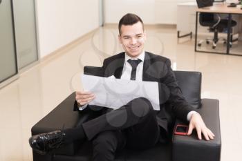 Young Businessman Writing A Letter - Notes Or Correspondence Or Signing A Document Or Agreement