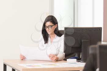 Business Ladie Writing A Letter - Notes Or Correspondence Or Signing A Document Or Agreement