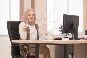 Happy Smiling Cheerful Muslim Business Woman With Thumbs Up Gesture