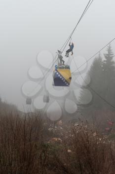 Trebevicka Zicara, Sarajevo, Bosnia and Herzegovina - April 05 2018: Exercise on Gondola Lift Car - Alpinist Is Rescue People From Gondola That Are Stuck