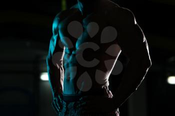 Bodybuilder Posing Silhouette In Different Poses Demonstrating Their Muscles - Male Showing Muscles - Beautiful Muscular Body Athlete