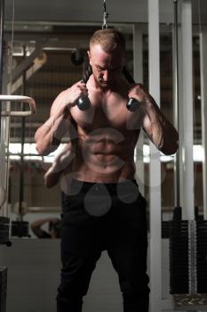 Man Athlete Doing Abs Exercise On Machine With As Part Of Bodybuilding Training