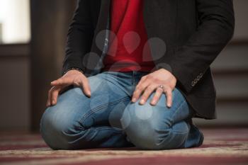 Close Up Of Man Hands Praying In Mosque