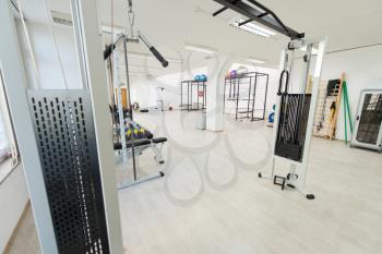 Equipment And Machines At The Modern Gym Room Fitness Center