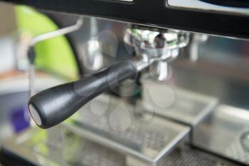 Close-up of Professional Coffee Machine Making Espresso in a Cafe