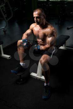 Handsome Good Looking And Attractive Mature Man With Muscular Body Relaxing In Gym
