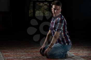 Young Muslim Man Is Praying In The Mosque