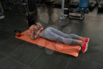 Fitness Woman Athlete Doing Abs Exercise As Part Of Bodybuilding Training