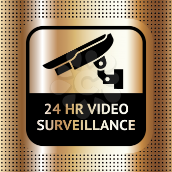 Video surveillance symbol on a metallic chromium golden background