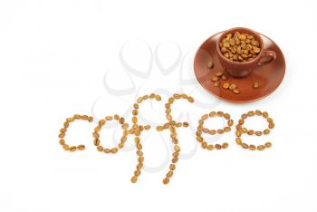 Royalty Free Photo of a Cup of Coffee and Beans Spelling the Word