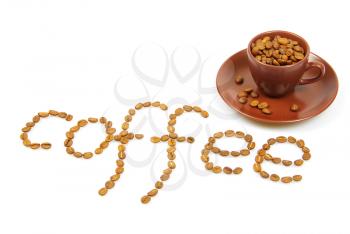 Royalty Free Photo of a Cup of Coffee Beans and the Word Coffee Spelled in Beans