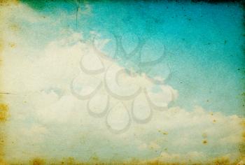 grunge image of blue sky with clouds
