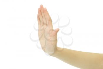 Womans hand showing stop gesture on white