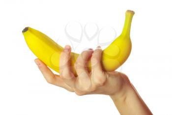 Banana in hand isolated on white
