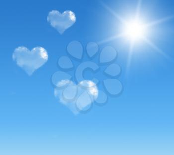 blue sky with hearts shape clouds